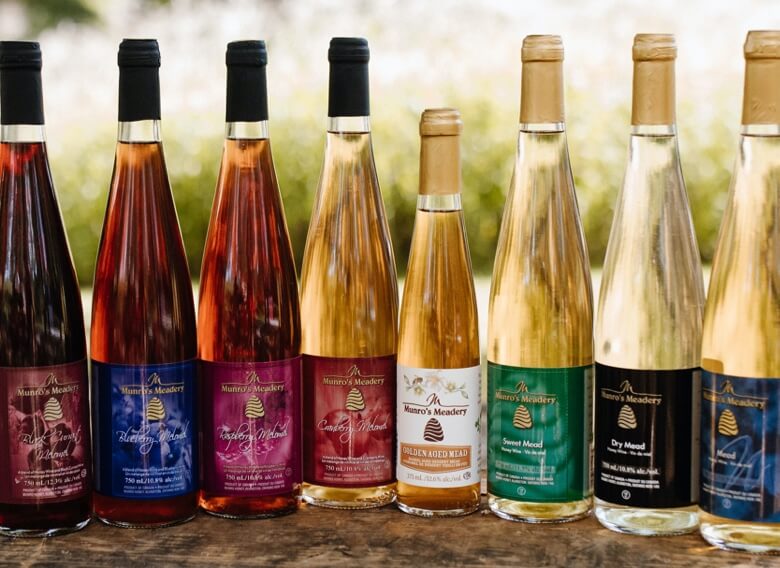 Lineup of Munro Honey branded mead bottles